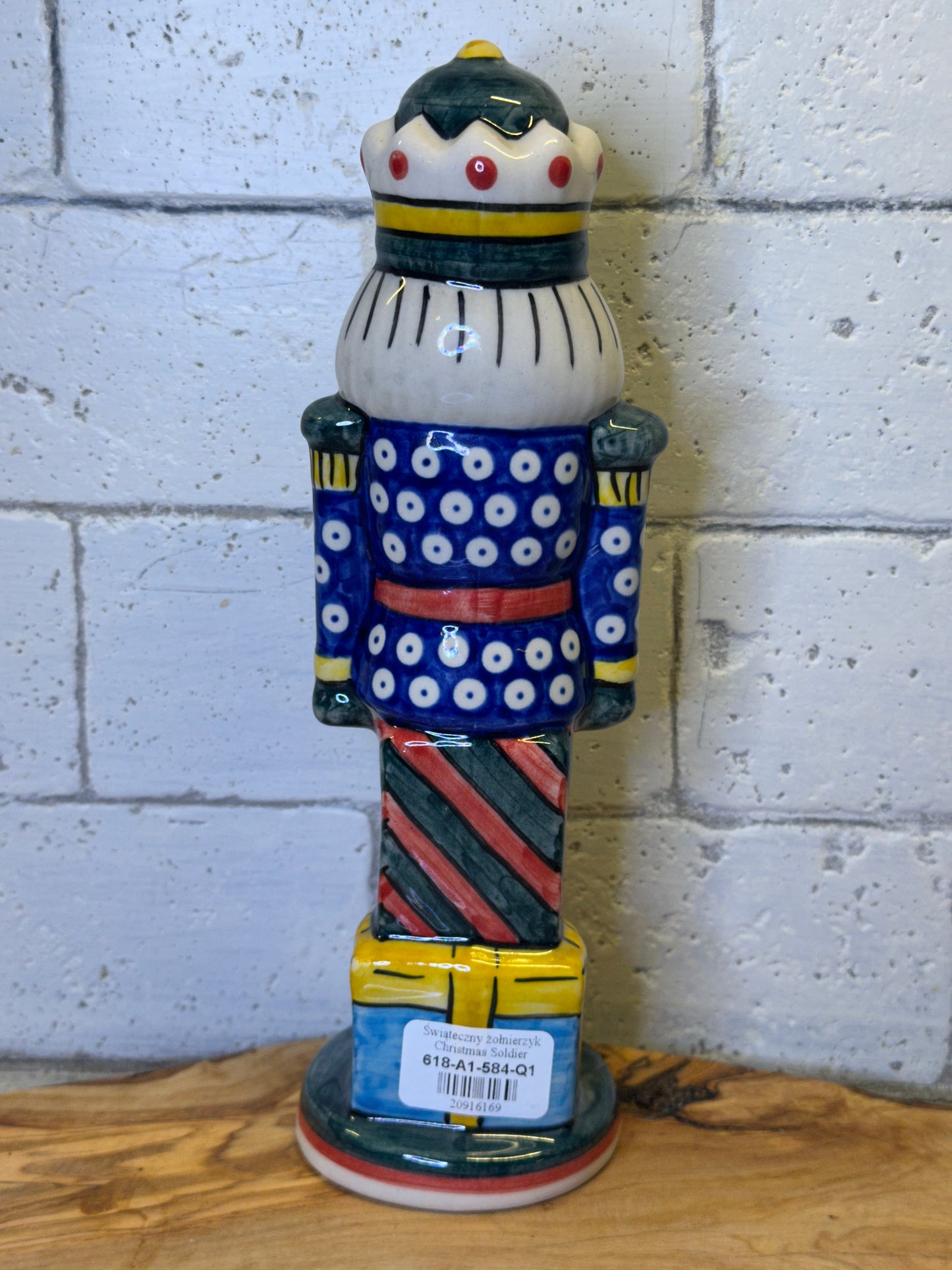 Vena Polish Pottery, Blue Suit with Colorful Presents Nutcracker 9.5"