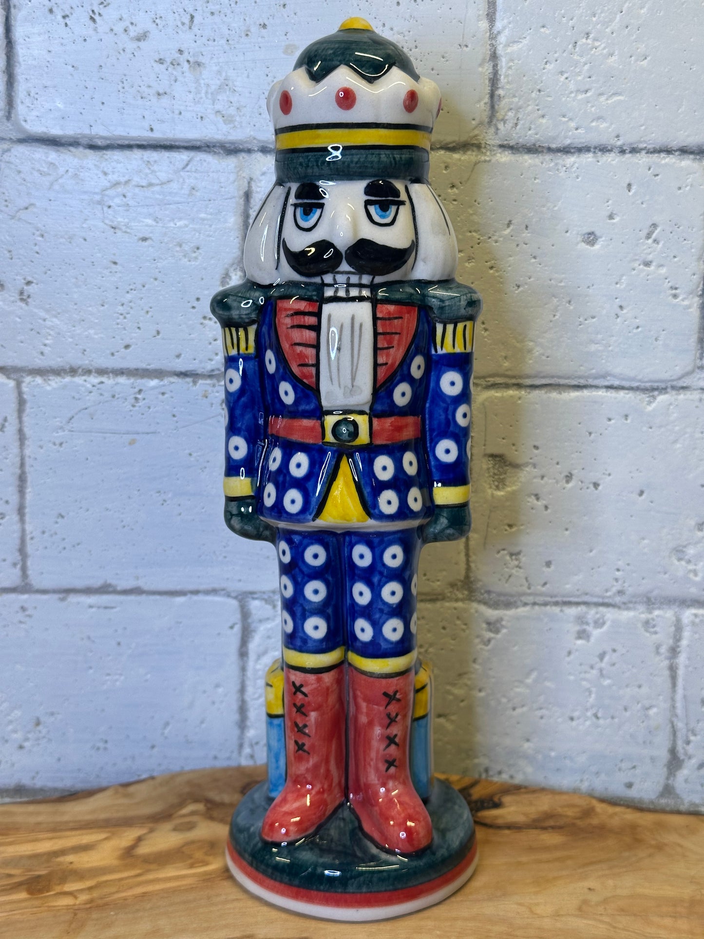 Vena Polish Pottery, Blue Suit with Colorful Presents Nutcracker 9.5"