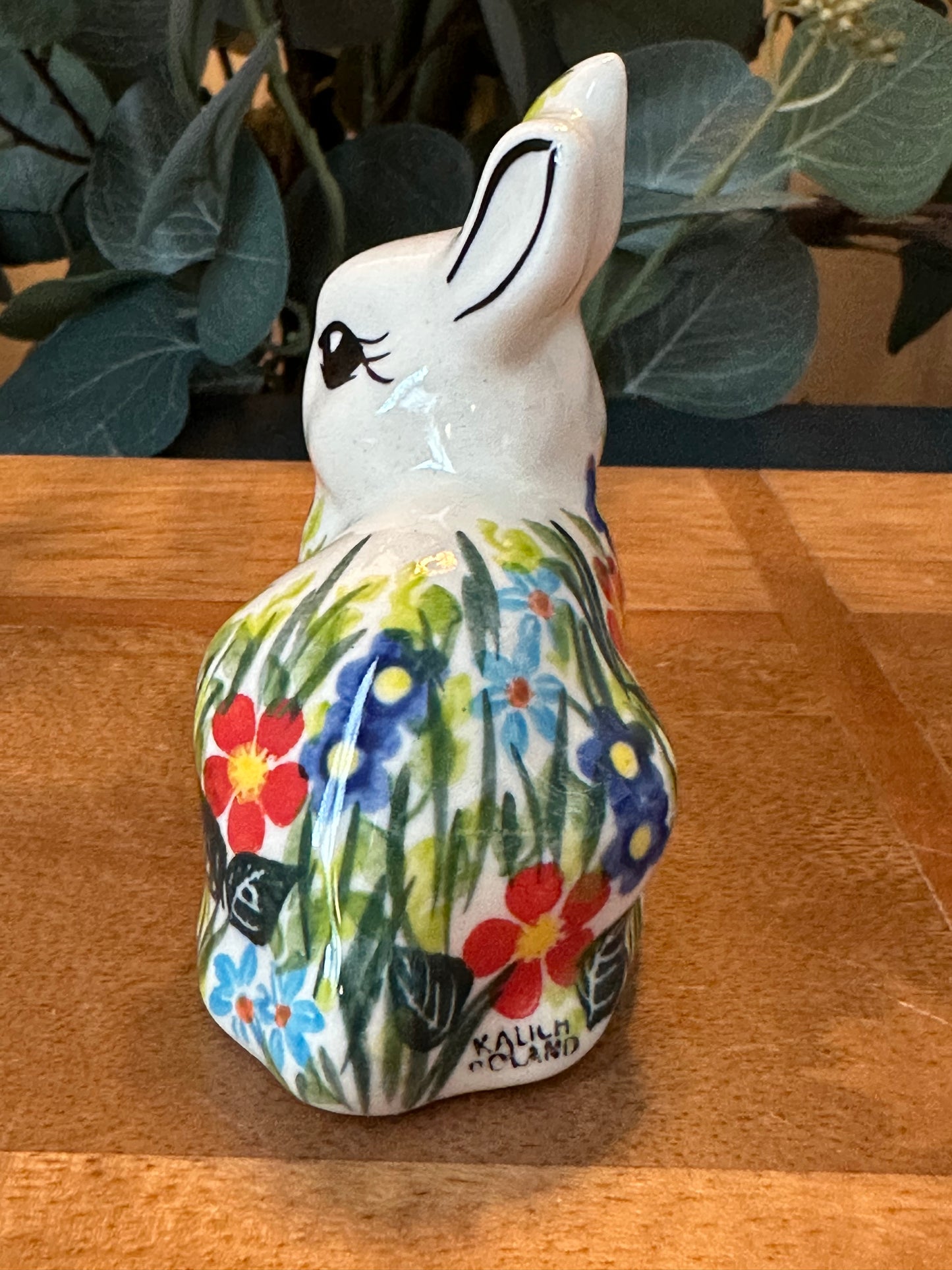 Kalich Polish Pottery, Art Level, Sitting Bunny Red, Purple, & Dark Blue Flower on Head