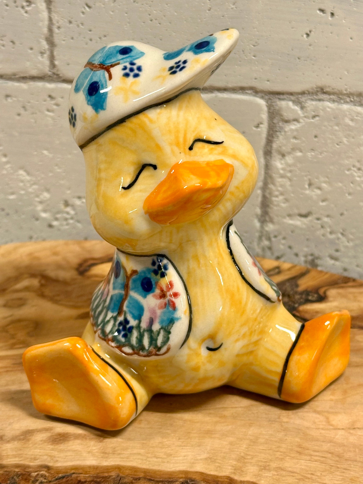 Vena, Garden of Eden Baby Duck with Cap Figurine